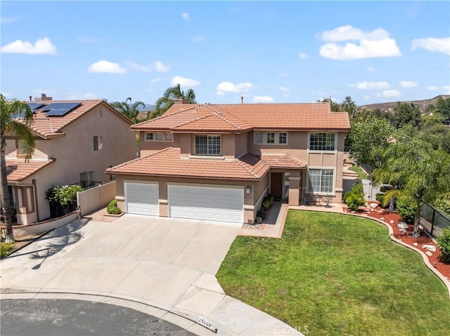 25300 Heather Vale St, Saugus, CA 91350 - mediterranean / spanish house featuring stucco siding, a tile roof, driveway, and an attached garage