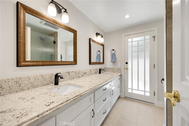 1463 Avolencia Dr, Fullerton, CA 92835 - bathroom with double vanity, tile patterned flooring, an enclosed shower, and recessed lighting