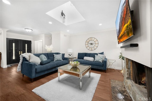 1463 Avolencia Dr, Fullerton, CA 92835 - living room with crown molding, baseboards, a fireplace, wood finished floors, and recessed lighting