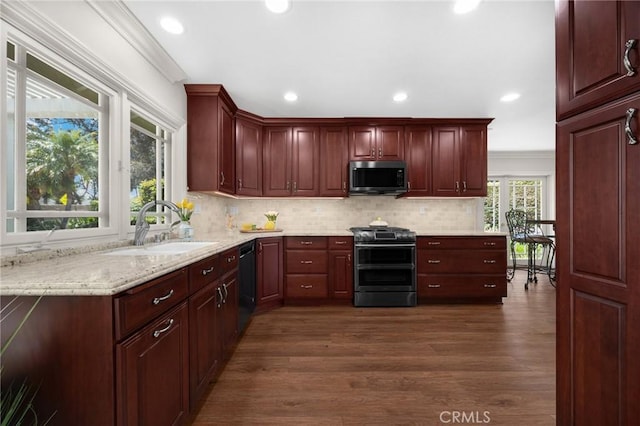1463 Avolencia Dr, Fullerton, CA 92835 - kitchen featuring appliances with stainless steel finishes, a sink, ornamental molding, dark wood finished floors, and decorative backsplash