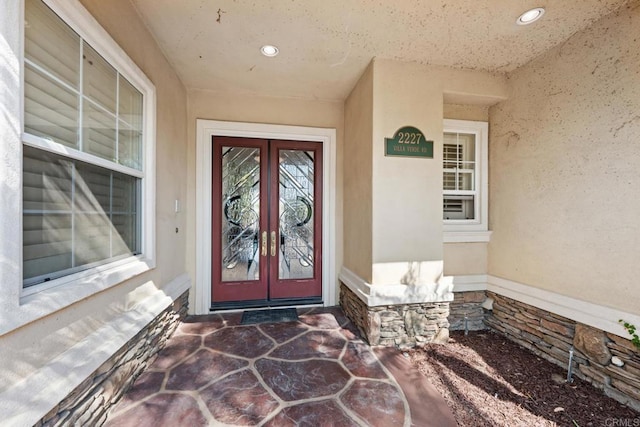 2227 Villa Verde Rd, Escondido, CA 92029 - doorway to property with french doors, stone siding, and stucco siding