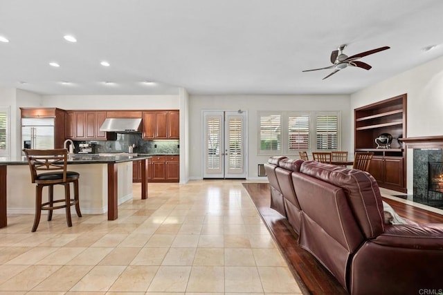2227 Villa Verde Rd, Escondido, CA 92029 - living room featuring ceiling fan, recessed lighting, a premium fireplace, and light tile patterned floors