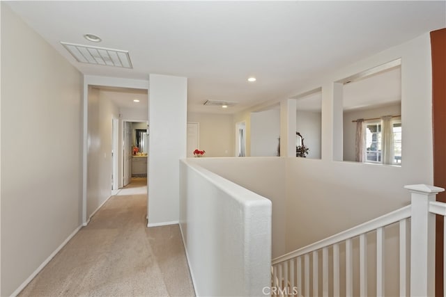 213 Caldera St, Perris, CA 92570 - corridor with an upstairs landing, recessed lighting, carpet flooring, and baseboards