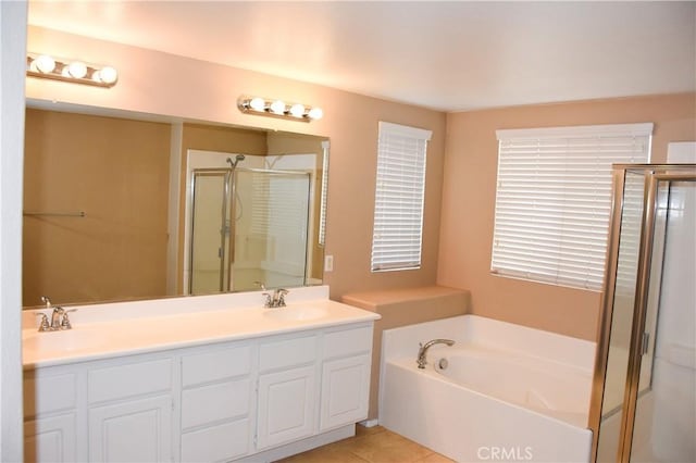 12655 Verano St, Victorville, CA 92392 - full bath featuring a shower stall, a garden tub, double vanity, and tile patterned flooring