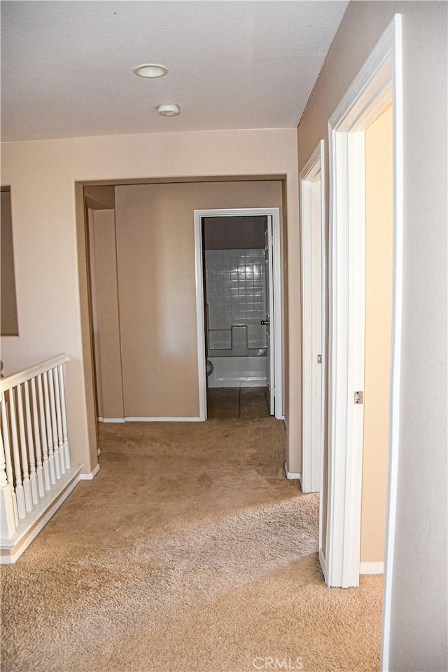 12655 Verano St, Victorville, CA 92392 - hallway featuring carpet flooring and baseboards