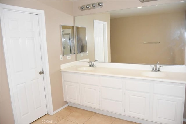 12655 Verano St, Victorville, CA 92392 - bathroom featuring tile patterned floors and double vanity