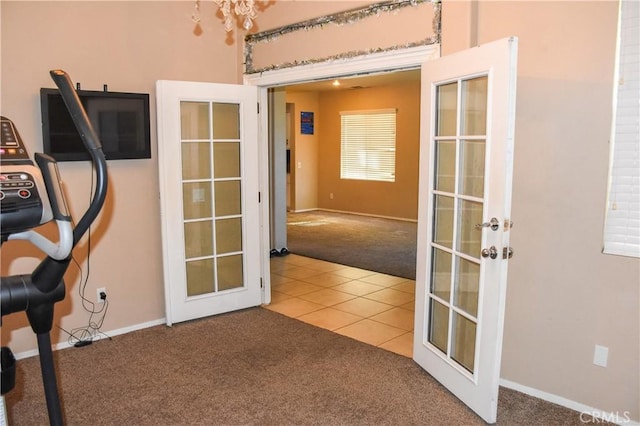 12655 Verano St, Victorville, CA 92392 - exercise room with carpet, french doors, baseboards, and a chandelier