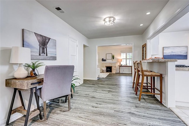 1217 S Gertruda Ave, Redondo Beach, CA 90277 - home office featuring wood finished floors, baseboards, a fireplace, and recessed lighting