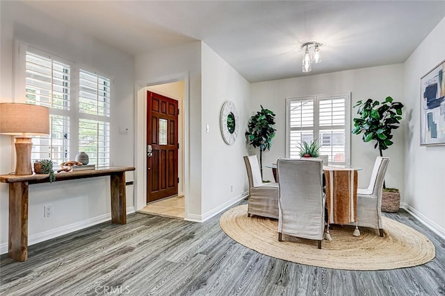 1217 S Gertruda Ave, Redondo Beach, CA 90277 - dining space with wood finished floors, plenty of natural light, and baseboards