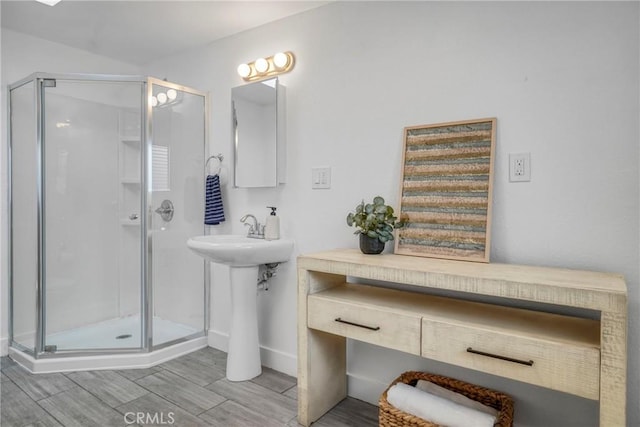 232 Howland Canal, Venice, CA 90291 - full bath featuring a stall shower, wood tiled floors, and baseboards