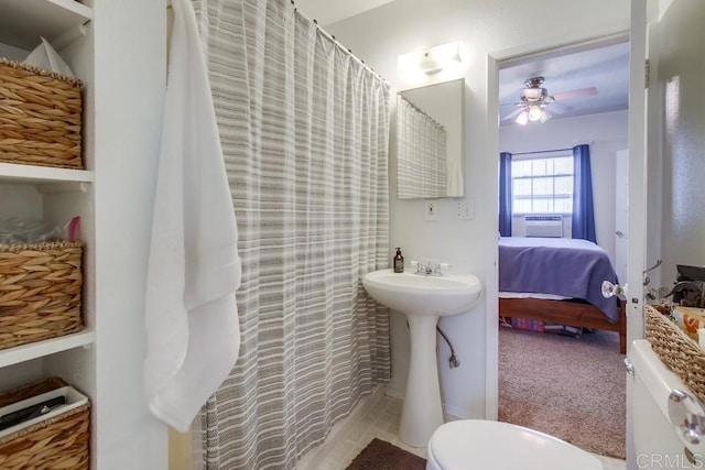 420921 3rd Ave, San Diego, CA 92103 - bathroom with toilet, a ceiling fan, connected bathroom, and cooling unit