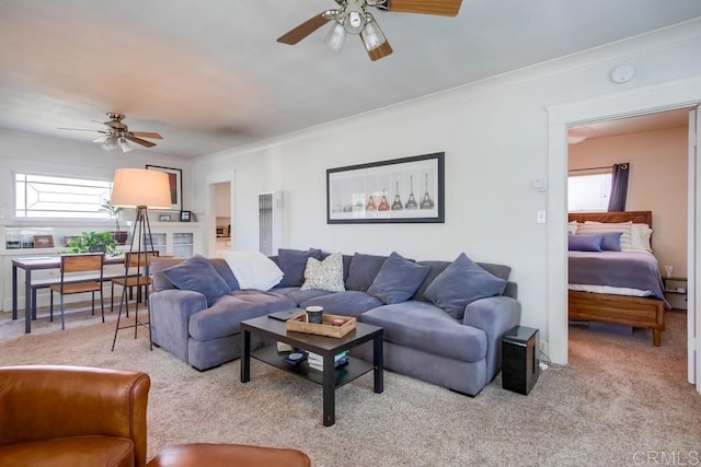 420921 3rd Ave, San Diego, CA 92103 - carpeted living room featuring a ceiling fan and ornamental molding
