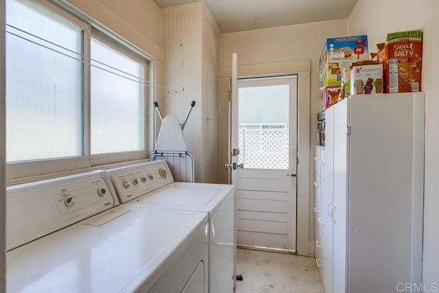 420921 3rd Ave, San Diego, CA 92103 - washroom featuring independent washer and dryer and plenty of natural light