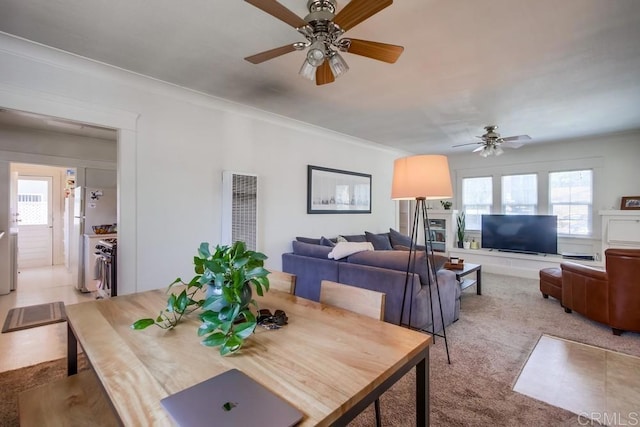 420921 3rd Ave, San Diego, CA 92103 - dining room featuring ceiling fan, a heating unit, light carpet, plenty of natural light, and ornamental molding