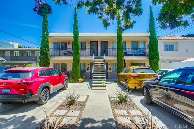 420921 3rd Ave, San Diego, CA 92103 - view of property featuring stairs and stucco siding