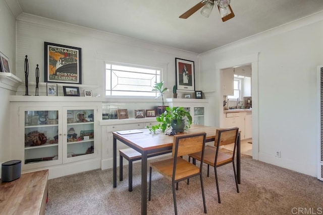 420921 3rd Ave, San Diego, CA 92103 - dining room with ornamental molding, light colored carpet, and ceiling fan