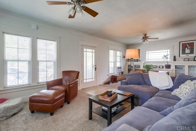 420921 3rd Ave, San Diego, CA 92103 - living area featuring a ceiling fan, ornamental molding, and light colored carpet