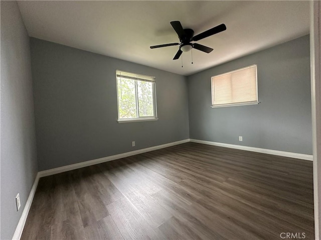 1227 N Fairvalley Ave, Covina, CA 91722 - empty room featuring dark wood-type flooring, baseboards, and ceiling fan