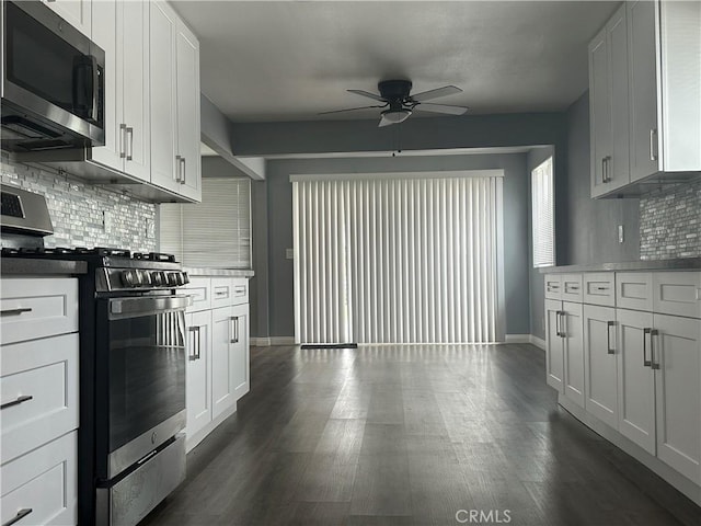 1227 N Fairvalley Ave, Covina, CA 91722 - kitchen with appliances with stainless steel finishes, a ceiling fan, baseboards, tasteful backsplash, and dark wood finished floors