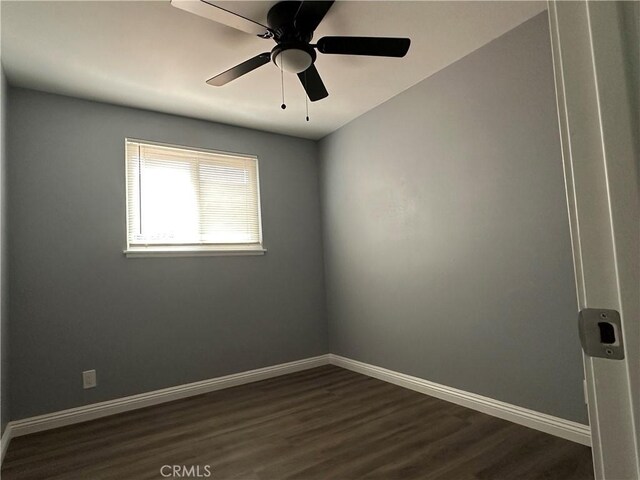 1227 N Fairvalley Ave, Covina, CA 91722 - spare room featuring dark wood finished floors, baseboards, and ceiling fan