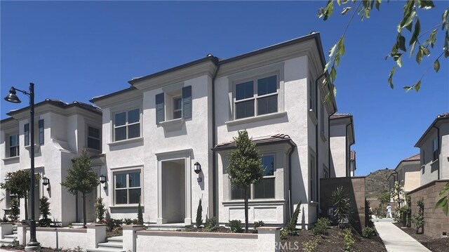 110 Sunnyside, Irvine, CA 92618 - view of front of property with stucco siding