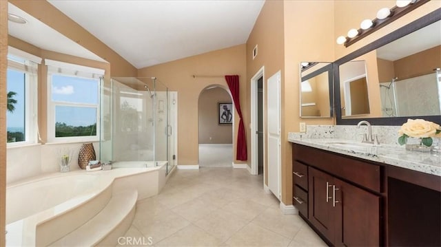 2210 Olympic View Dr, Chino Hills, CA 91709 - bathroom with lofted ceiling, a stall shower, vanity, a garden tub, and tile patterned flooring