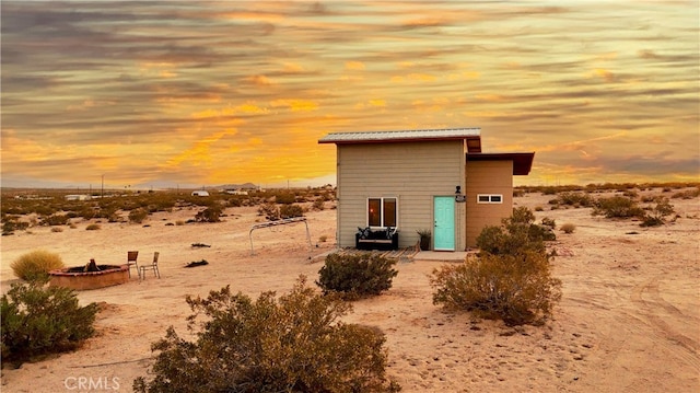 310 Enchanted Rd, Joshua Tree, CA 92252 - view of outbuilding with a fire pit