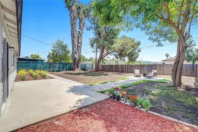 1152 W Tudor St, San Dimas, CA 91773 - fenced backyard with a patio area and an outdoor hangout area