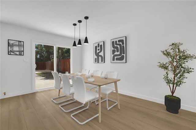 1152 W Tudor St, San Dimas, CA 91773 - dining area with light wood-type flooring and baseboards