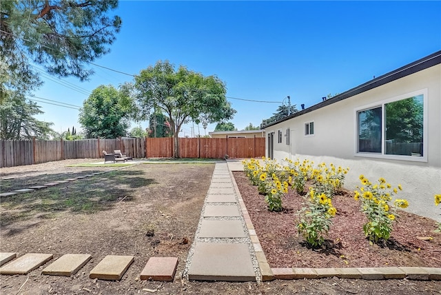 1152 W Tudor St, San Dimas, CA 91773 - fenced backyard with a patio area