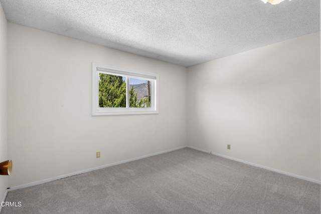 6421 Almar St, Simi Valley, CA 93063 - carpeted spare room featuring a textured ceiling and baseboards