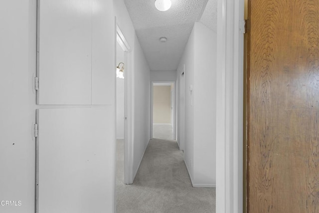 6421 Almar St, Simi Valley, CA 93063 - corridor with light carpet and a textured ceiling