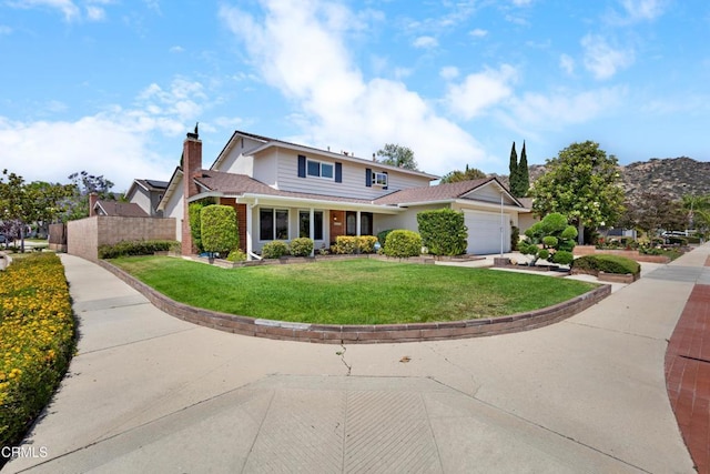 6421 Almar St, Simi Valley, CA 93063 - traditional-style house with a garage, a chimney, and brick siding