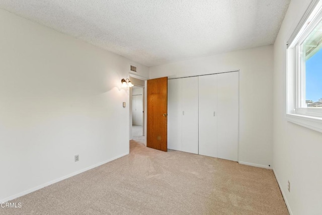 6421 Almar St, Simi Valley, CA 93063 - unfurnished bedroom featuring carpet flooring, a textured ceiling, and a closet