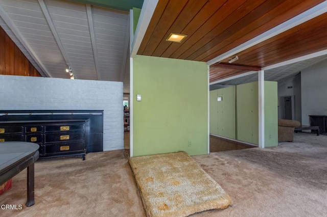 1330 Fern Oaks Dr, Santa Paula, CA 93060 - carpeted living area featuring a fireplace and a wood ceiling with exposed beams