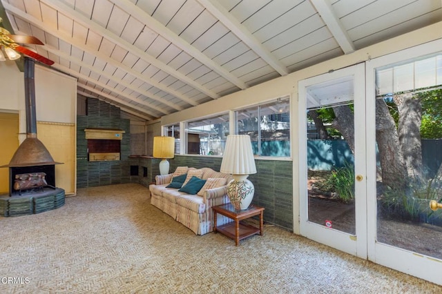 1330 Fern Oaks Dr, Santa Paula, CA 93060 - sunroom with a fireplace, healthy amount of natural light, a wood stove, and ceiling fan
