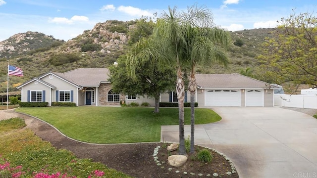 23406 Oakely Pl, Ramona, CA 92065 - single story home with a tiled roof, concrete driveway, a garage, and a mountain view