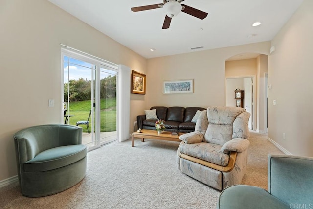 23406 Oakely Pl, Ramona, CA 92065 - living area with carpet floors, arched walkways, a ceiling fan, baseboards, and recessed lighting