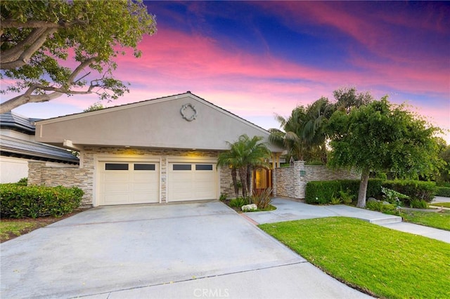 3 Harbor Ridge Dr, Newport Beach, CA 92660 - ranch-style home featuring stone siding, a garage, concrete driveway, and stucco siding