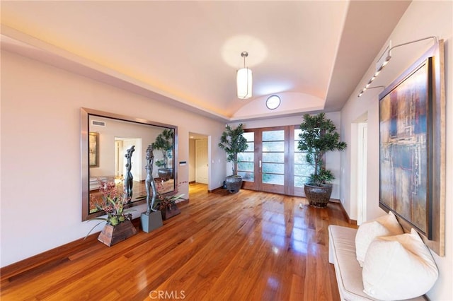 3 Harbor Ridge Dr, Newport Beach, CA 92660 - entryway featuring vaulted ceiling, french doors, and wood finished floors