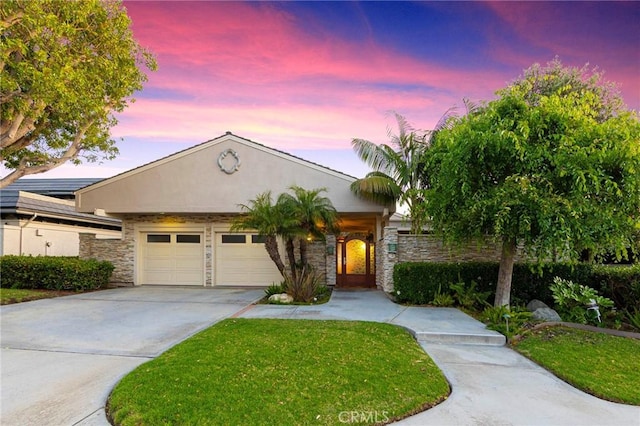 3 Harbor Ridge Dr, Newport Beach, CA 92660 - ranch-style home with a garage, stone siding, driveway, stucco siding, and a yard