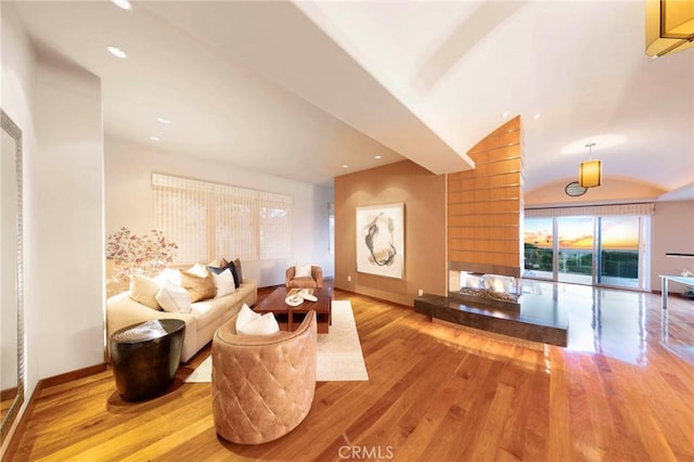 3 Harbor Ridge Dr, Newport Beach, CA 92660 - living area featuring wood finished floors, vaulted ceiling, and recessed lighting
