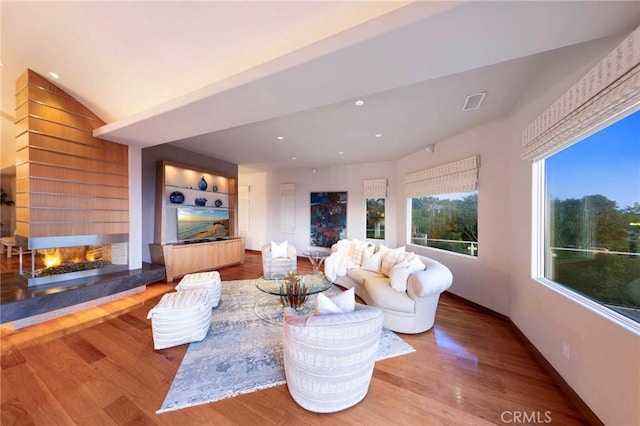 3 Harbor Ridge Dr, Newport Beach, CA 92660 - living room with wood finished floors, a multi sided fireplace, and recessed lighting