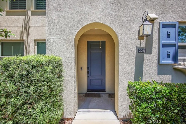 228 Borrego, Irvine, CA 92618 - property entrance featuring stucco siding