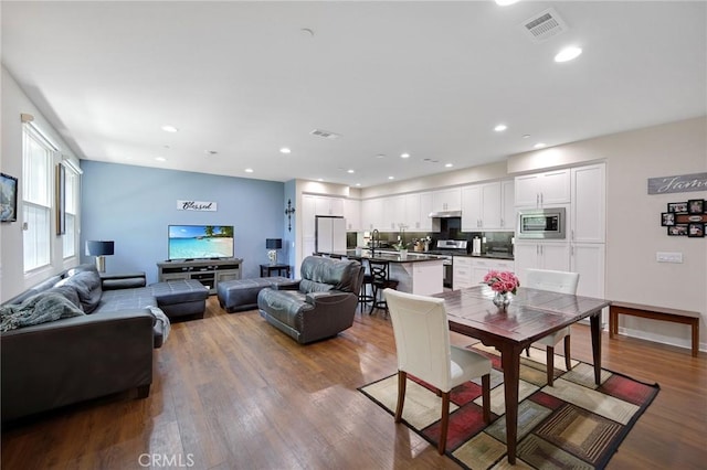 228 Borrego, Irvine, CA 92618 - dining space with wood finished floors and recessed lighting