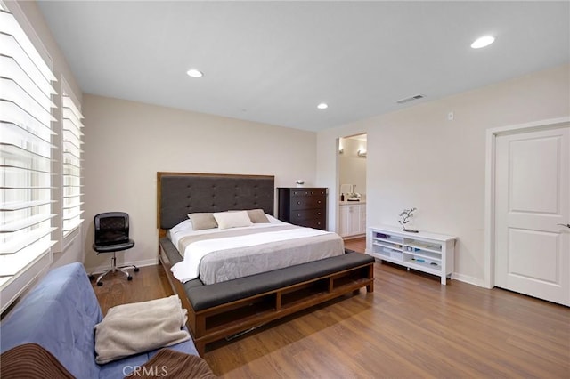 228 Borrego, Irvine, CA 92618 - bedroom with wood finished floors, recessed lighting, and ensuite bathroom