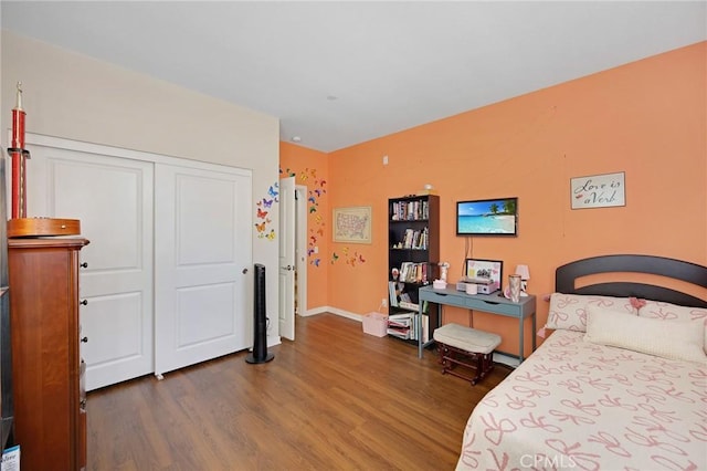 228 Borrego, Irvine, CA 92618 - bedroom featuring wood finished floors and a closet