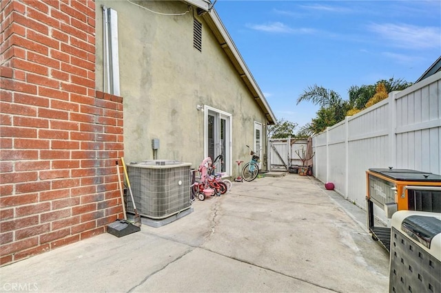1523 Lynton Ave, Wilmington, CA 90744 - view of patio featuring cooling unit and a gate
