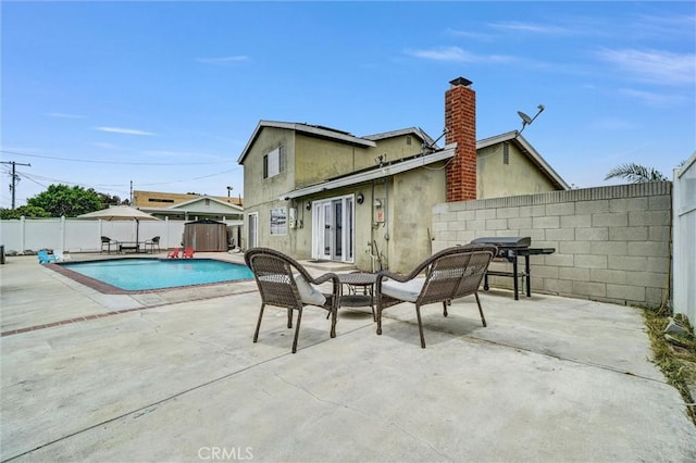 1523 Lynton Ave, Wilmington, CA 90744 - view of swimming pool featuring a fenced backyard and a patio
