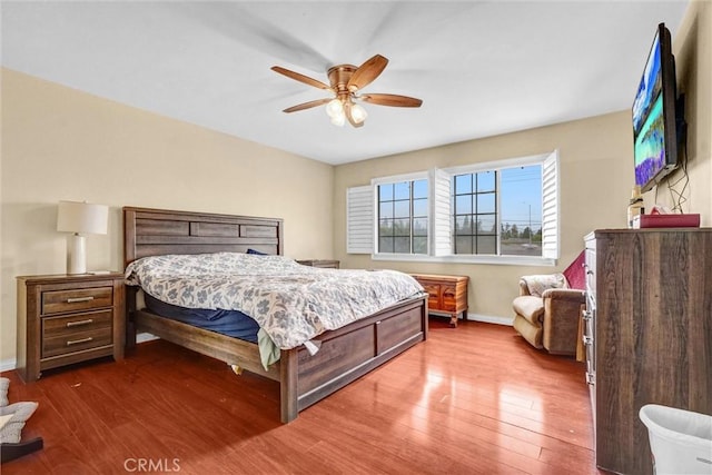 1523 Lynton Ave, Wilmington, CA 90744 - bedroom with wood finished floors, baseboards, and ceiling fan